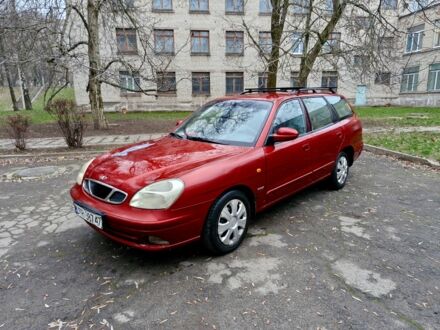 Красный Дэу Нубира, объемом двигателя 2 л и пробегом 300 тыс. км за 1200 $, фото 1 на Automoto.ua