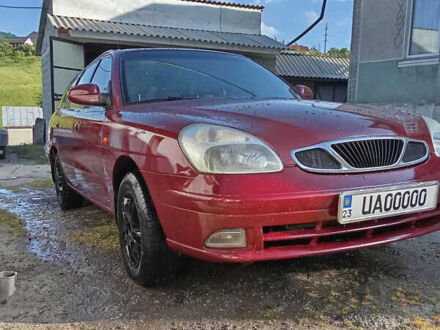 Красный Дэу Нубира, объемом двигателя 1.6 л и пробегом 340 тыс. км за 2650 $, фото 1 на Automoto.ua