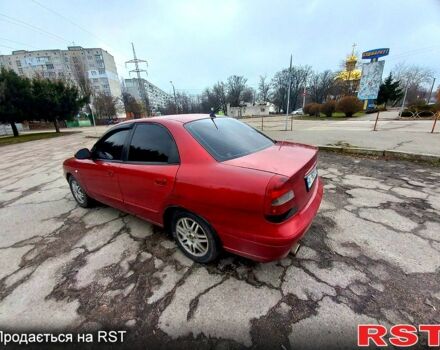 Красный Дэу Нубира, объемом двигателя 2 л и пробегом 320 тыс. км за 2100 $, фото 1 на Automoto.ua