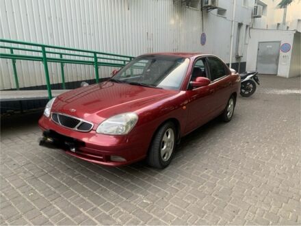 Красный Дэу Нубира, объемом двигателя 2 л и пробегом 314 тыс. км за 3000 $, фото 1 на Automoto.ua