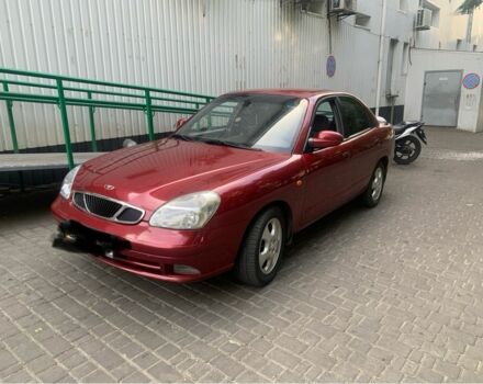 Красный Дэу Нубира, объемом двигателя 2 л и пробегом 314 тыс. км за 3000 $, фото 1 на Automoto.ua