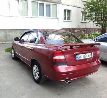 Деу Нубіра 2003 у Хмельницькому на Automoto.ua Червоний Деу Нубіра, об'ємом двигуна 2 л та пробігом 166 тис. км за 3500 $, фото 1 на Automoto.ua