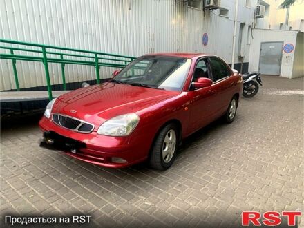 Красный Дэу Нубира, объемом двигателя 2 л и пробегом 314 тыс. км за 3000 $, фото 1 на Automoto.ua