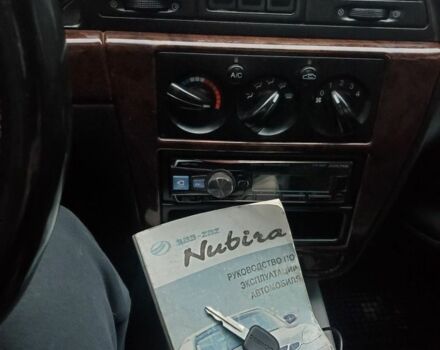 Красный Дэу Нубира, объемом двигателя 2 л и пробегом 300 тыс. км за 2300 $, фото 1 на Automoto.ua