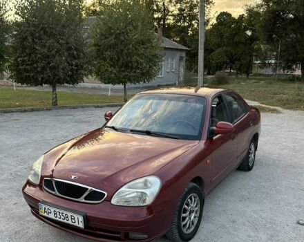 Красный Дэу Нубира, объемом двигателя 2 л и пробегом 302 тыс. км за 2050 $, фото 1 на Automoto.ua