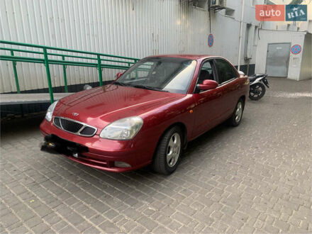 Красный Дэу Нубира, объемом двигателя 2 л и пробегом 314 тыс. км за 3000 $, фото 1 на Automoto.ua