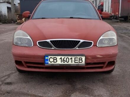 Червоний Деу Нубіра, об'ємом двигуна 2 л та пробігом 321 тис. км за 1600 $, фото 1 на Automoto.ua