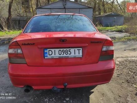 Червоний Деу Нубіра, об'ємом двигуна 2 л та пробігом 300 тис. км за 1750 $, фото 1 на Automoto.ua