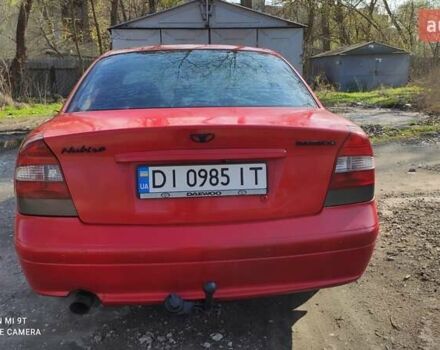 Красный Дэу Нубира, объемом двигателя 2 л и пробегом 300 тыс. км за 1750 $, фото 1 на Automoto.ua