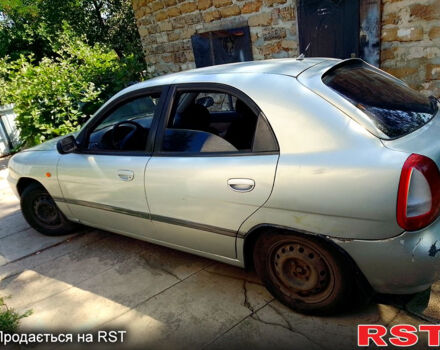 Серый Дэу Нубира, объемом двигателя 1.6 л и пробегом 345 тыс. км за 1500 $, фото 3 на Automoto.ua