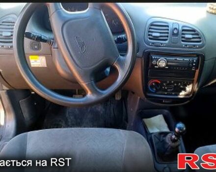 Серый Дэу Нубира, объемом двигателя 1.6 л и пробегом 245 тыс. км за 1202 $, фото 2 на Automoto.ua