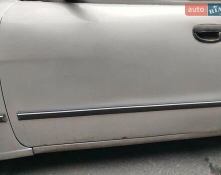 Сірий Деу Нубіра, об'ємом двигуна 1.6 л та пробігом 262 тис. км за 1750 $, фото 2 на Automoto.ua