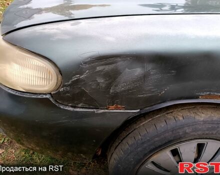 Серый Дэу Нубира, объемом двигателя 1.6 л и пробегом 350 тыс. км за 1100 $, фото 3 на Automoto.ua