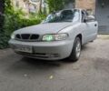 Серый Дэу Нубира, объемом двигателя 1.6 л и пробегом 340 тыс. км за 1600 $, фото 1 на Automoto.ua