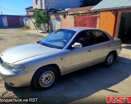 Серый Дэу Нубира, объемом двигателя 1.6 л и пробегом 270 тыс. км за 2200 $, фото 1 на Automoto.ua