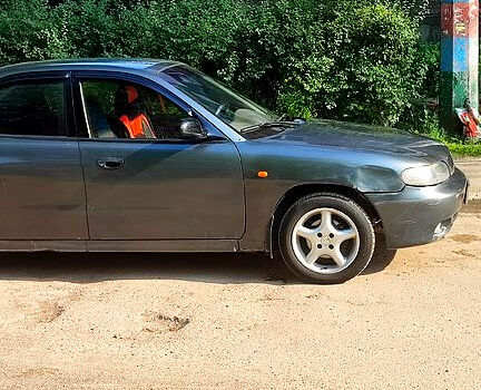 Серый Дэу Нубира, объемом двигателя 1.6 л и пробегом 220 тыс. км за 1700 $, фото 4 на Automoto.ua