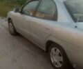 Серый Дэу Нубира, объемом двигателя 1.6 л и пробегом 303 тыс. км за 3500 $, фото 1 на Automoto.ua