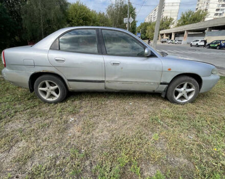 Серый Дэу Нубира, объемом двигателя 1.6 л и пробегом 246 тыс. км за 1250 $, фото 2 на Automoto.ua