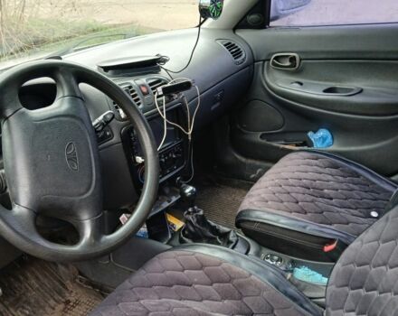 Сірий Деу Нубіра, об'ємом двигуна 1.6 л та пробігом 280 тис. км за 1500 $, фото 4 на Automoto.ua