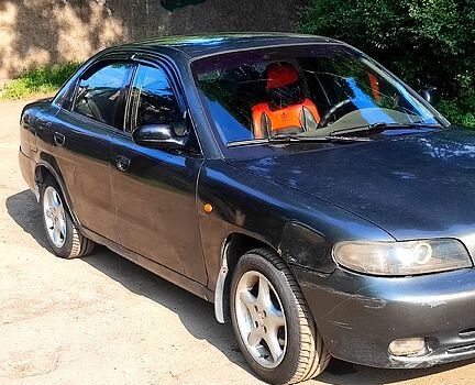 Серый Дэу Нубира, объемом двигателя 1.6 л и пробегом 220 тыс. км за 1700 $, фото 3 на Automoto.ua