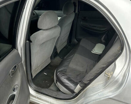 Серый Дэу Нубира, объемом двигателя 1.6 л и пробегом 255 тыс. км за 713 $, фото 4 на Automoto.ua