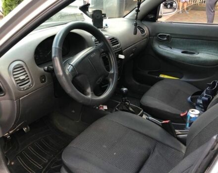 Сірий Деу Нубіра, об'ємом двигуна 1.6 л та пробігом 305 тис. км за 1250 $, фото 5 на Automoto.ua