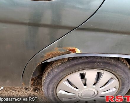 Серый Дэу Нубира, объемом двигателя 1.6 л и пробегом 350 тыс. км за 1100 $, фото 4 на Automoto.ua