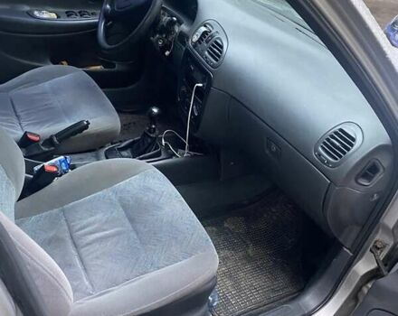 Серый Дэу Нубира, объемом двигателя 1.6 л и пробегом 198 тыс. км за 1400 $, фото 9 на Automoto.ua