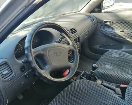 Серый Дэу Нубира, объемом двигателя 1.6 л и пробегом 281 тыс. км за 1700 $, фото 5 на Automoto.ua