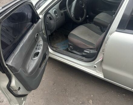 Серый Дэу Нубира, объемом двигателя 1.6 л и пробегом 200 тыс. км за 616 $, фото 4 на Automoto.ua