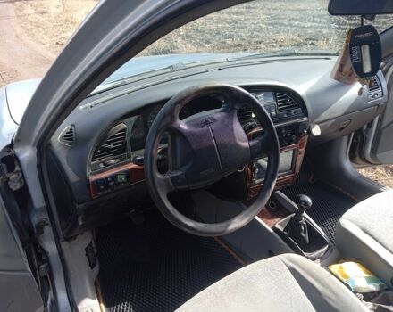 Сірий Деу Нубіра, об'ємом двигуна 2 л та пробігом 297 тис. км за 1600 $, фото 4 на Automoto.ua