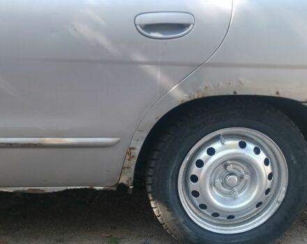 Серый Дэу Нубира, объемом двигателя 2 л и пробегом 290 тыс. км за 900 $, фото 9 на Automoto.ua