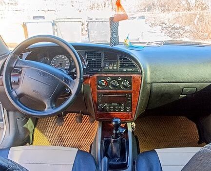 Серый Дэу Нубира, объемом двигателя 2 л и пробегом 270 тыс. км за 2750 $, фото 8 на Automoto.ua