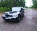 Серый Дэу Нубира, объемом двигателя 2 л и пробегом 230 тыс. км за 1400 $, фото 1 на Automoto.ua