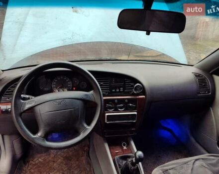 Серый Дэу Нубира, объемом двигателя 2 л и пробегом 200 тыс. км за 2300 $, фото 1 на Automoto.ua