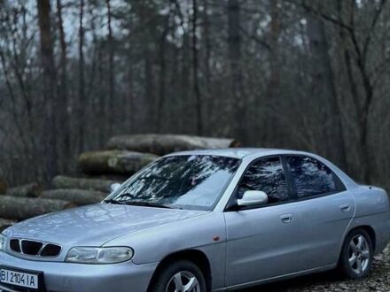 Серый Дэу Нубира, объемом двигателя 1.6 л и пробегом 235 тыс. км за 1900 $, фото 1 на Automoto.ua