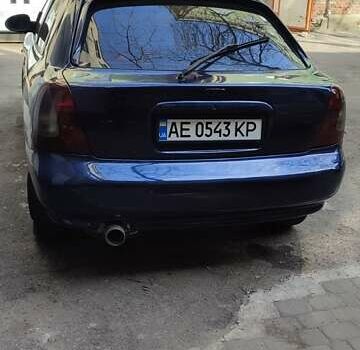 Синій Деу Нубіра, об'ємом двигуна 1.6 л та пробігом 260 тис. км за 2700 $, фото 5 на Automoto.ua