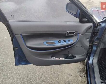 Синій Деу Нубіра, об'ємом двигуна 2 л та пробігом 180 тис. км за 2999 $, фото 27 на Automoto.ua