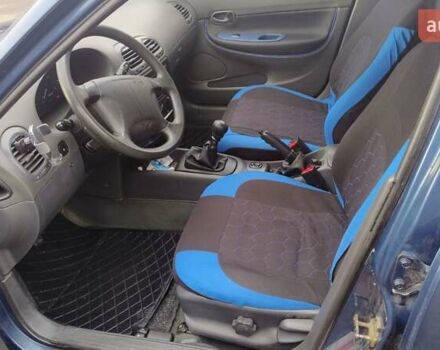 Синій Деу Нубіра, об'ємом двигуна 2 л та пробігом 180 тис. км за 2999 $, фото 28 на Automoto.ua