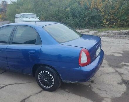Синій Деу Нубіра, об'ємом двигуна 2 л та пробігом 250 тис. км за 1099 $, фото 9 на Automoto.ua