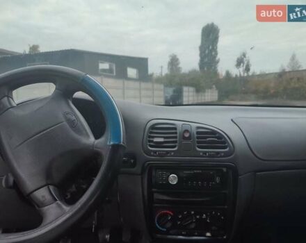 Синій Деу Нубіра, об'ємом двигуна 2 л та пробігом 250 тис. км за 1099 $, фото 7 на Automoto.ua