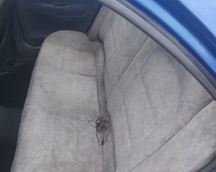 Синій Деу Нубіра, об'ємом двигуна 2 л та пробігом 250 тис. км за 1099 $, фото 4 на Automoto.ua