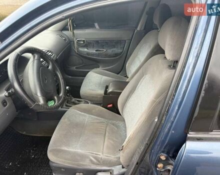 Синий Дэу Нубира, объемом двигателя 1.6 л и пробегом 300 тыс. км за 1294 $, фото 7 на Automoto.ua