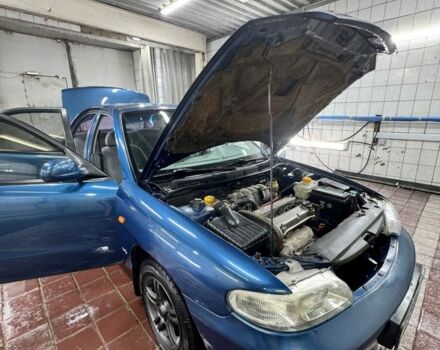 Синій Деу Нубіра, об'ємом двигуна 1.6 л та пробігом 268 тис. км за 2400 $, фото 14 на Automoto.ua