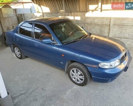 Синій Деу Нубіра, об'ємом двигуна 1.6 л та пробігом 182 тис. км за 2400 $, фото 1 на Automoto.ua