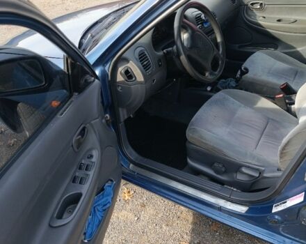 Синій Деу Нубіра, об'ємом двигуна 1 л та пробігом 320 тис. км за 1600 $, фото 2 на Automoto.ua