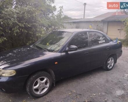 Синій Деу Нубіра, об'ємом двигуна 1.6 л та пробігом 330 тис. км за 1500 $, фото 3 на Automoto.ua