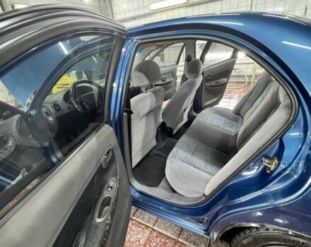 Синій Деу Нубіра, об'ємом двигуна 1.6 л та пробігом 268 тис. км за 2400 $, фото 4 на Automoto.ua