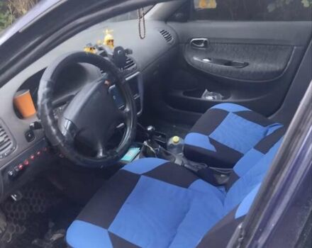 Синій Деу Нубіра, об'ємом двигуна 1.6 л та пробігом 330 тис. км за 1500 $, фото 4 на Automoto.ua