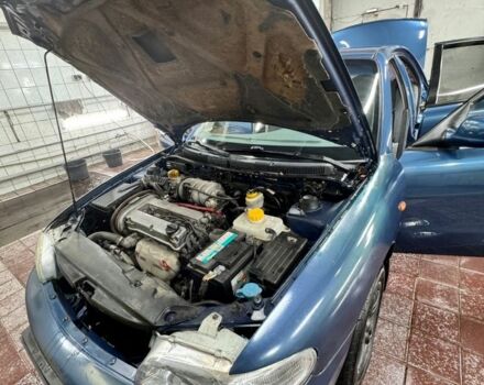 Синій Деу Нубіра, об'ємом двигуна 1.6 л та пробігом 268 тис. км за 2400 $, фото 6 на Automoto.ua